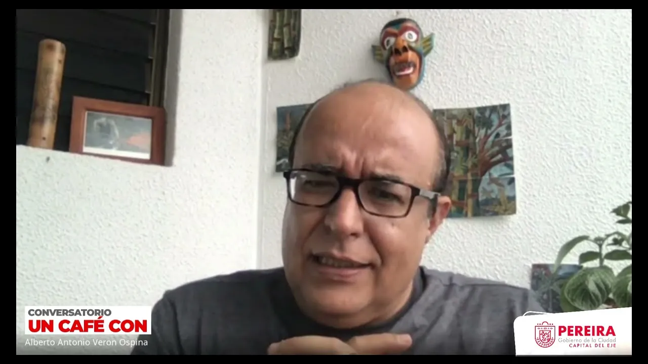 Un café con rigoberto Gil Montoya y Alberto Berón